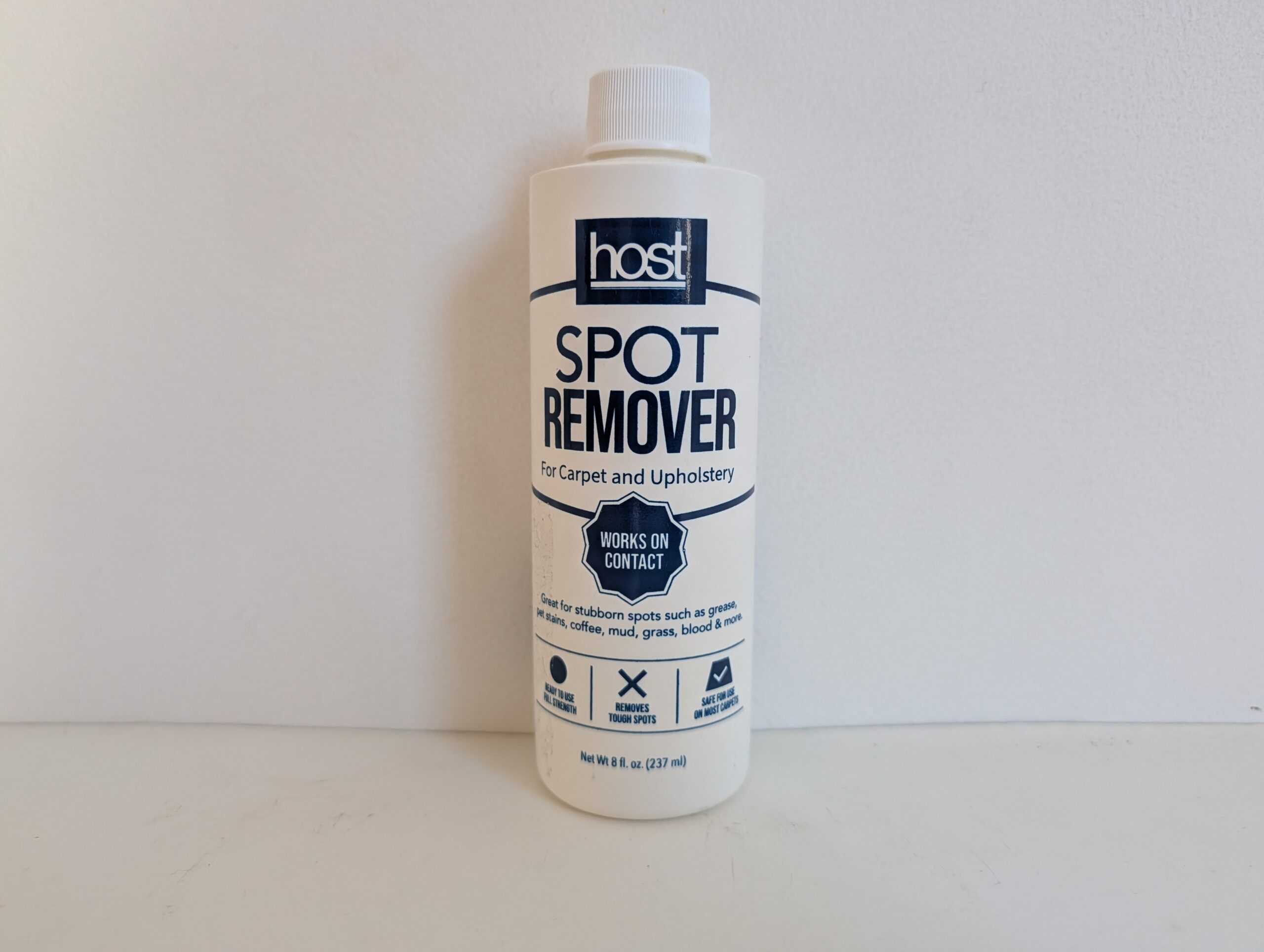 Bottle of host Spot Remover for fabric and upholstery stains.